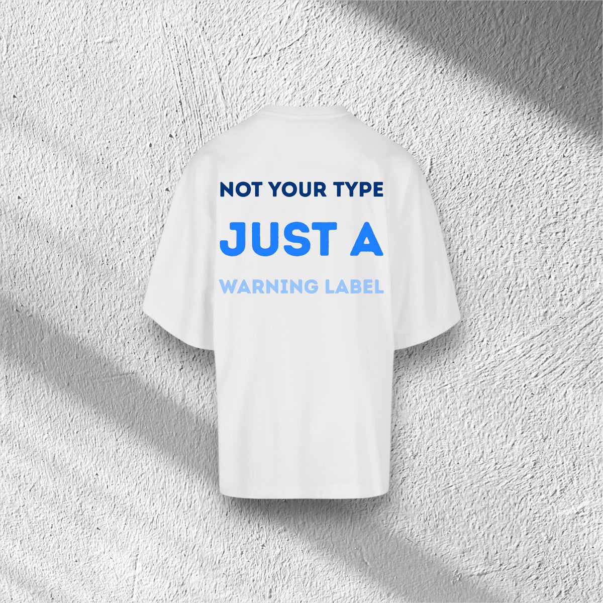 Warning Label | Huge Tee